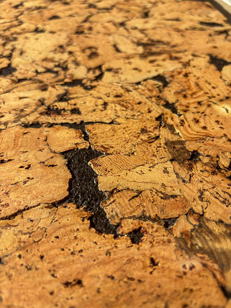 istock Natural cork with dark resinous seams and gaps 2250997611