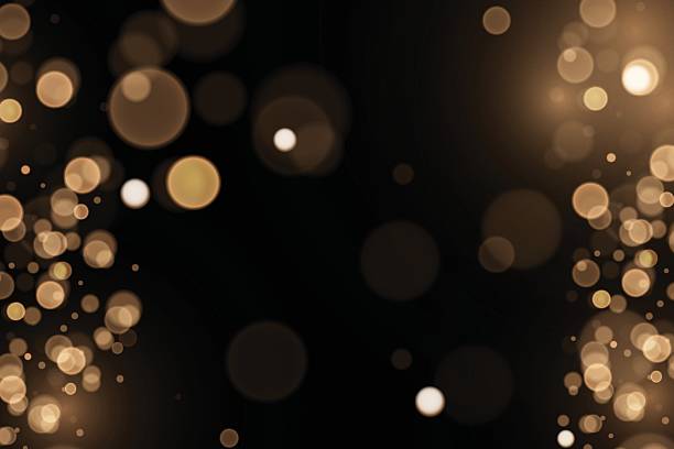 istock Christmas light effect. Sparkling magical dust particles.The dust sparks and golden stars shine with special light. 2251001582