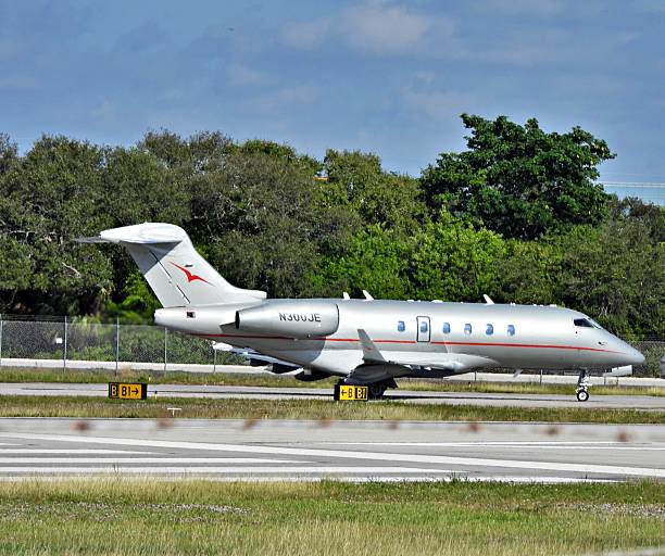 Boca Raton, Palm Beach County, Florida – USA, December 5, 2025. A Bombardier fixed wing multi engine (8 seats / 2 engines) N300JE waiting to take off from the Boca Raton Airport.