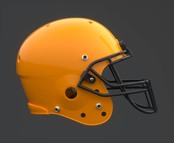 istock 3D Glossy Orange American Football Helmet on Dark Studio Background 2251008552