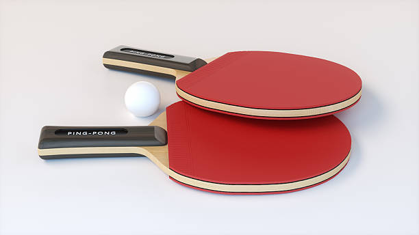An african-american black female business executive is cheerfully playing table tennis at a leisure room