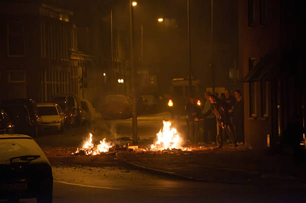 Groningen, Netherlands - January 1, 2009. Outdoor scene showing people lighting fireworks during new years festivities in the Dutch city of Groningen.