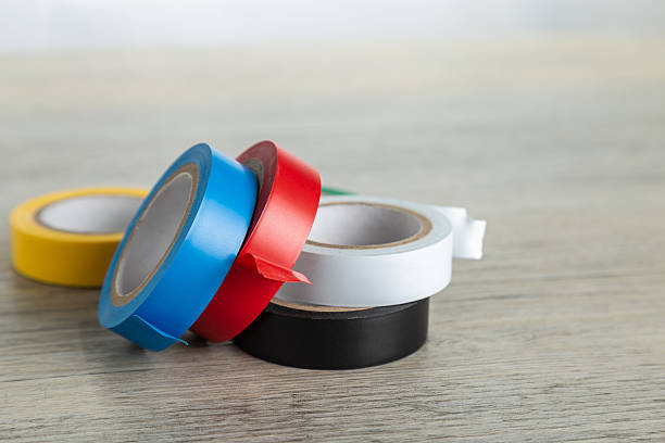 istock Colored rolls of electrical tape stacked 2251017382