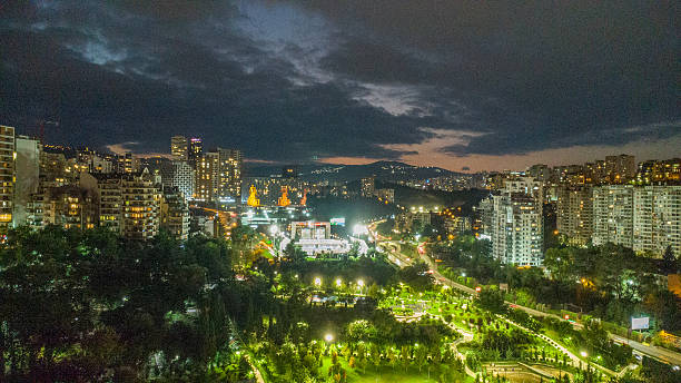 istock Aerial night view on Tbilsi : at left - Vake district , at right - Saburtalo  (Chabua amirejibi road  divide) 2251019578