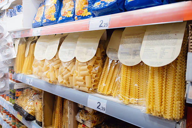 Italian pasta packages in a supermarket shelf