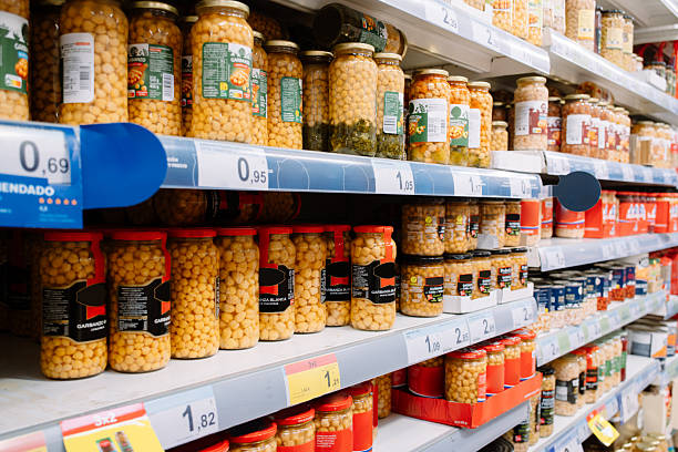 Jars of chickpeas in a supermarket shelf