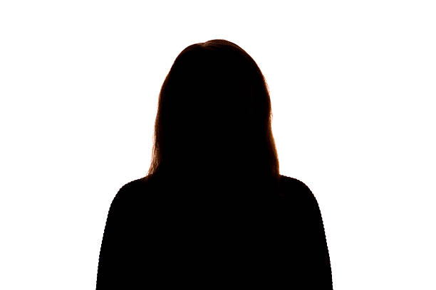 istock Silhouette of young woman facing camera on white background 2251023281