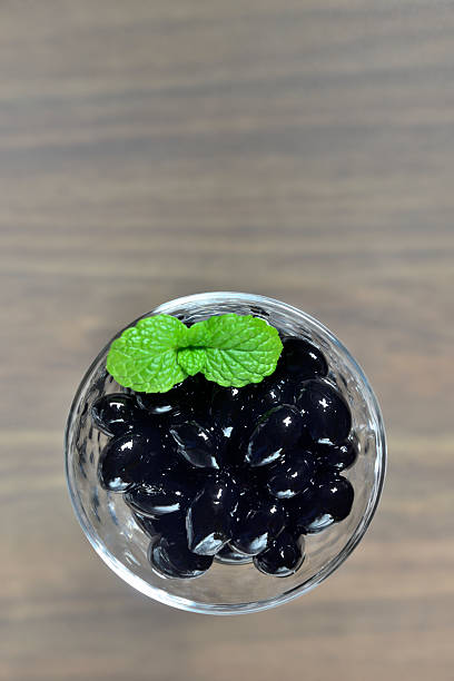 Japanese stewed black beans served on a small plate