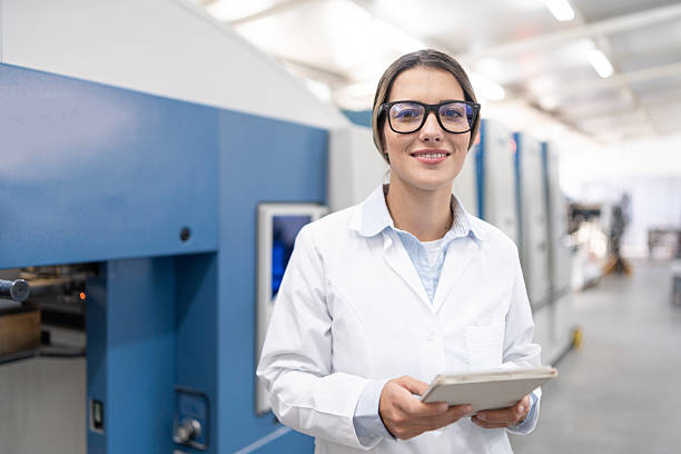 istock Woman specialist working in a modern printing house 2251031085