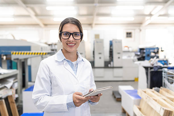 istock Woman specialist working in a modern printing house 2251031147