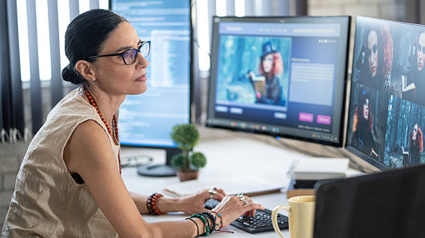 istock Senior female website designer, generates an image with artificial intelligence and creates a prompt 2251031213