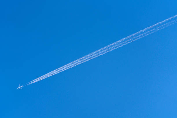 White Clouds Blue Sky Fluffy Sun Flare Airplane Trail Sunny Daytime Texture Background
