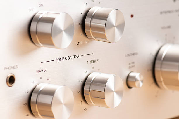 Detailed view of an audio device interface, displaying bass, treble, balance, and power controls.