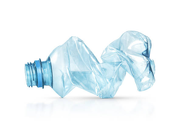 istock blue plastic bottle, heavily wrinkled, is isolated on a white background with shadow and reflection 2251034248