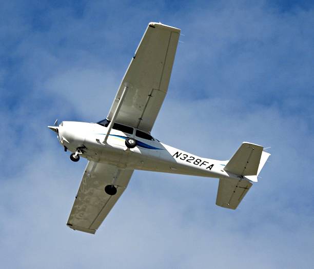Boca Raton, Palm Beach County, Florida – USA, December 8, 2025. A Textron Cessna Skyhawk 172S fixed wing single engine (4 seats / 1 engine) N328FA taking off from the Boca Raton Airport.