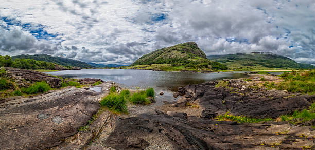 A vast body of water surrounded by towering mountains in Ireland.