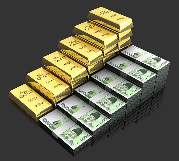 South Korea’s emerging local monetary and precious metal policy. Cash 10000 Won bundles and gold ingots rising step by step on black background. / You can see the animation movie of this image from my iStock video portfolio. Video number: 2251034702