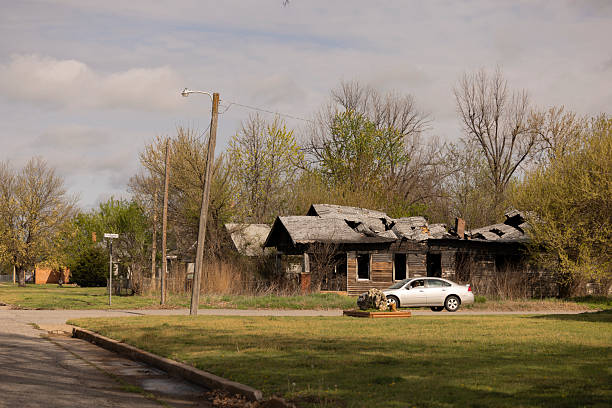 Anadarko, Oklahoma, USA - April 4, 2025: A single family home crumbles in a neighborhood.