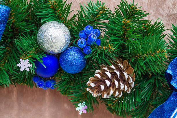 istock Christmas decorations with colorful ornaments, glowing lights, festive tree baubles 2251051861