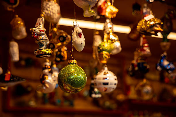 istock Christmas decorations with colorful ornaments, glowing lights, festive tree baubles 2251053683