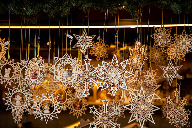 istock Christmas decorations with colorful ornaments, glowing lights, festive tree baubles 2251053703