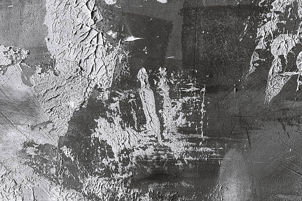 istock Grunge black concrete texture wall with white paint strokes for abstract background and interior design 2251059253