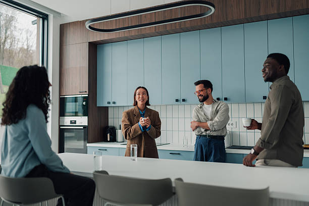 istock Diverse business colleagues having casual conversation during coffee break 2251060982