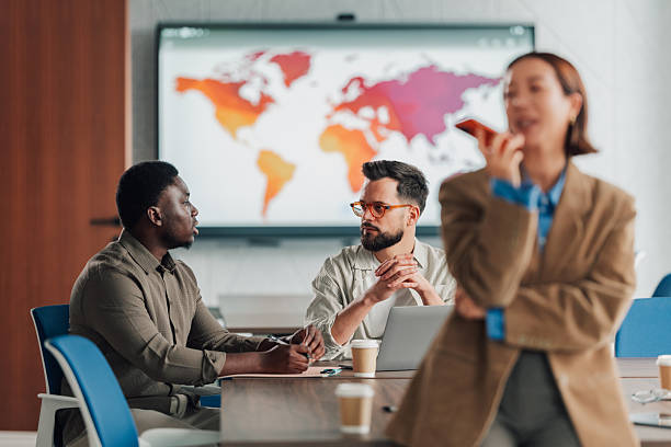 istock Diverse business team collaborating during global strategy meeting 2251064430