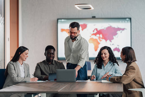 istock Diverse business team collaborating during a global strategy meeting 2251064673
