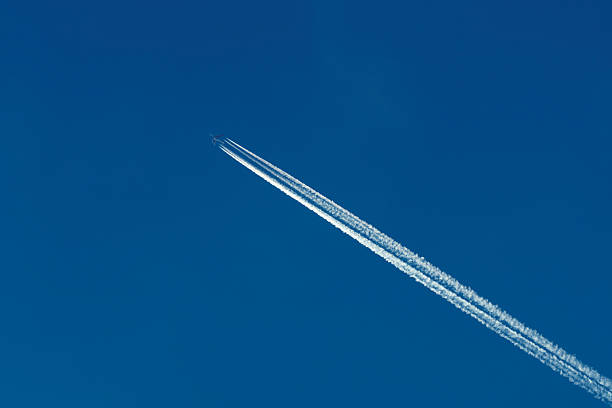 White Clouds Blue Sky Fluffy Sun Flare Airplane Trail Sunny Daytime Texture Background