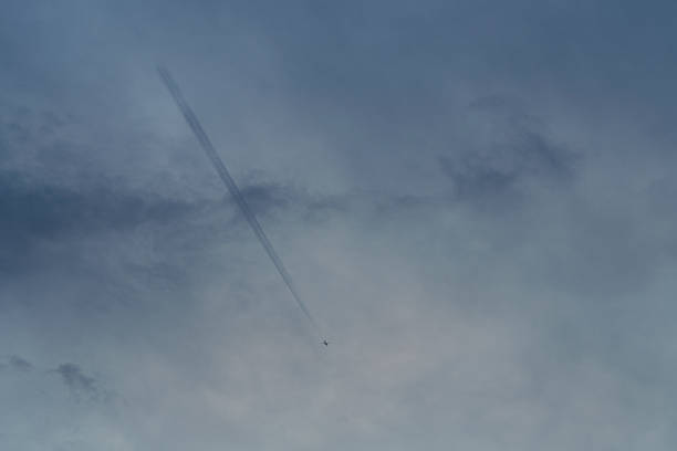 White Clouds Blue Sky Fluffy Sun Flare Airplane Trail Sunny Daytime Texture Background