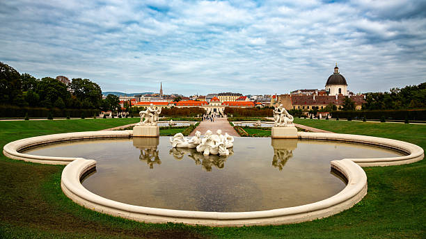 Austia, Vienna - September 25, 2023: Vienna, Austria  - October 1, 2023:  The Belvedere is a historic architectural ensemble, composed of two Baroque palaces, orangeries, and stables. These buildings are nestled in the heart of a Baroque park, in the city's third arrondissement, at the southern edge of the city center. It is an exceptional art gallery and one of the most popular tourist sites. Whether for a stroll or to capture the artwork in photographs, it is a majestic place, which explains its popularity.
