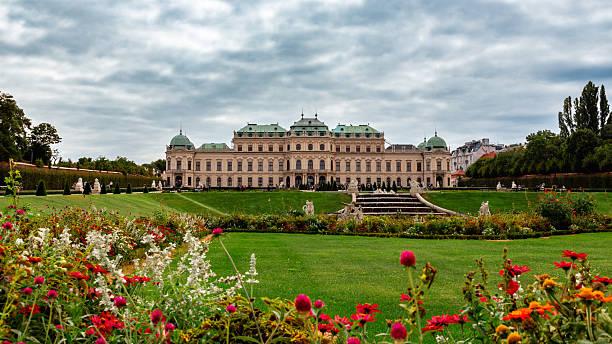 Austia, Vienna - September 25, 2023: Vienna, Austria  - October 1, 2023:  The Belvedere is a historic architectural ensemble, composed of two Baroque palaces, orangeries, and stables. These buildings are nestled in the heart of a Baroque park, in the city's third arrondissement, at the southern edge of the city center. It is an exceptional art gallery and one of the most popular tourist sites. Whether for a stroll or to capture the artwork in photographs, it is a majestic place, which explains its popularity.