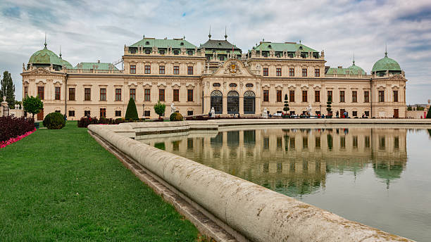 Austia, Vienna - September 25, 2023: Vienna, Austria  - October 1, 2023:  The Belvedere is a historic architectural ensemble, composed of two Baroque palaces, orangeries, and stables. These buildings are nestled in the heart of a Baroque park, in the city's third arrondissement, at the southern edge of the city center. It is an exceptional art gallery and one of the most popular tourist sites. Whether for a stroll or to capture the artwork in photographs, it is a majestic place, which explains its popularity.