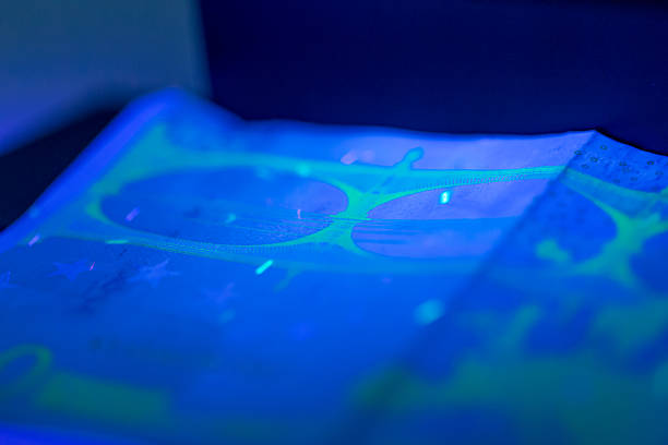 istock Unique glow of printed materials under ultraviolet light in indoor setting 2251067406