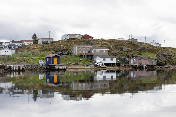 istock Colorful Coastal Village By The Water With Reflections 2251078596