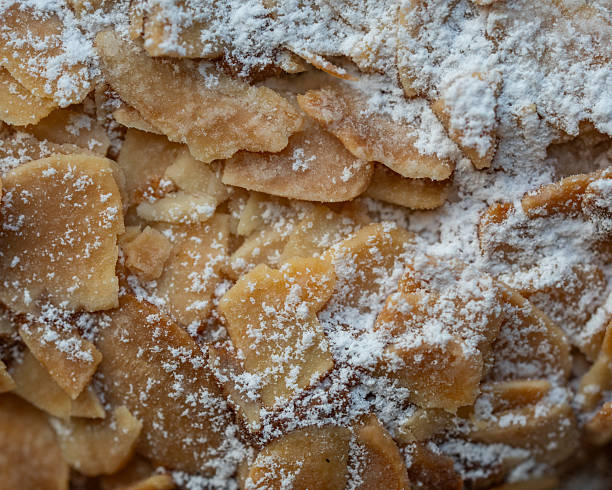 istock close up of almonds on a pastry covered in sugar 2251079122