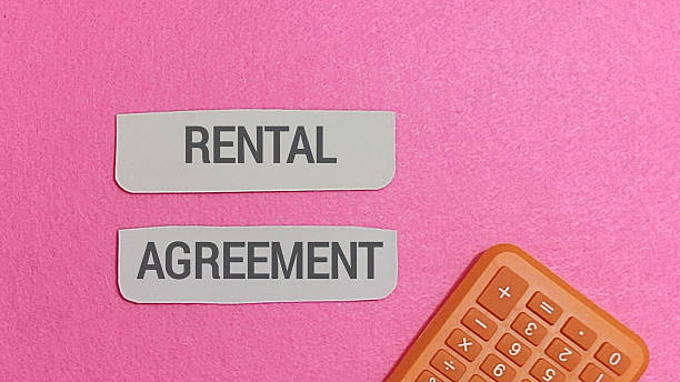 istock Rental agreement terms and associated financial calculations are visually represented by cutout labels placed. 2251092669