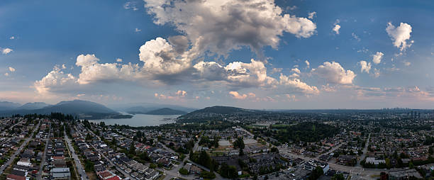 istock Panoramic View of Burnaby Cityscape Featuring Mountains and Cloudy Sky 2251099087