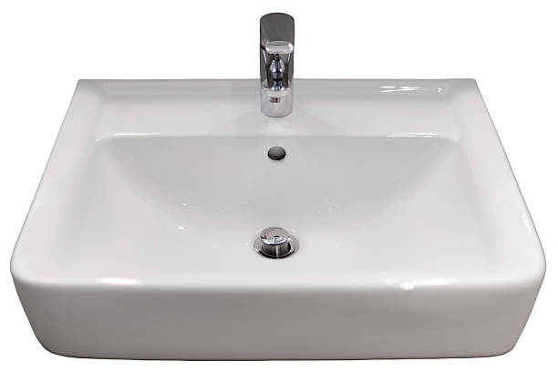 istock A modern sink is shown cut out on a white background. The design features a simple basin, a faucet, and a drain at the center. This could be used for home improvement or design ideas 2251119631