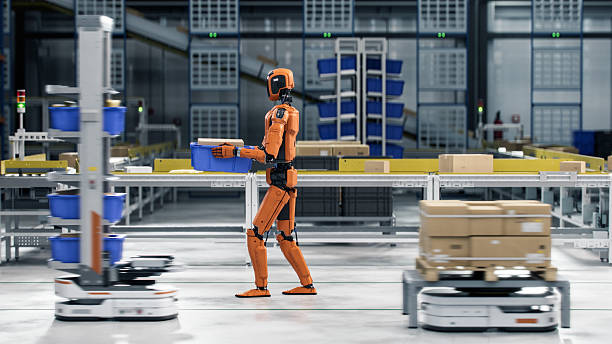 istock 3D Render: Side view of Industrial Autonomous AI Enabled General Purpose Humanoid Robot Carrying a Package at Automated Distribution Warehouse. Industrial Automation with Artificial Intelligence 2251121598
