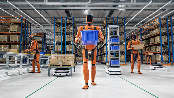 istock 3D Render: Portrait of  Autonomous AI-Powered General Purpose Humanoid Robots Working at Distribution Center. Automated Fulfillment Warehouse. Industrial Automation with Artificial Intelligence 2251121601