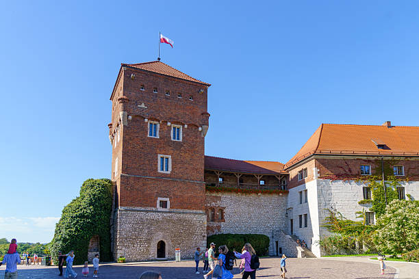 Krakow, Poland - September 21, 2025: View of the Wawel Castle courtyard, with locals and visitors, in Krakow, Poland
