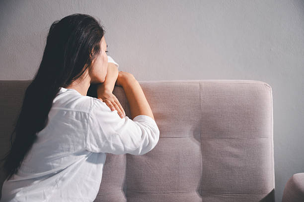 istock Sorrowful woman sat alone, overwhelmed by emotion, her sad and unhappy expression revealing deep despair, stress and distress left feeling depressed. sorrowful sad, despair alone, depressed stress 2251122882