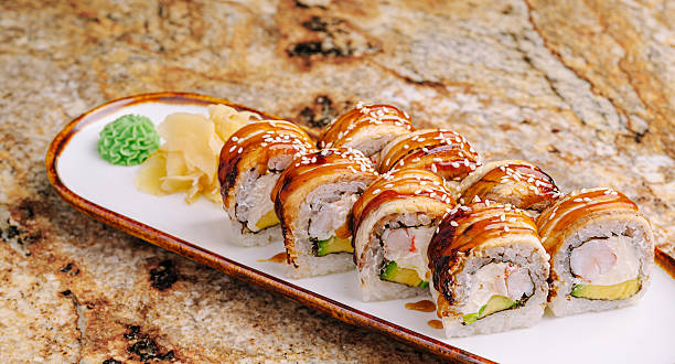 istock Sushi rolls arranged neatly on a platter with ginger and wasabi 2251124354