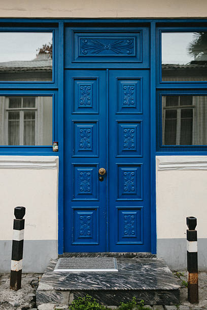 istock a blue door in a modern house 2251124940