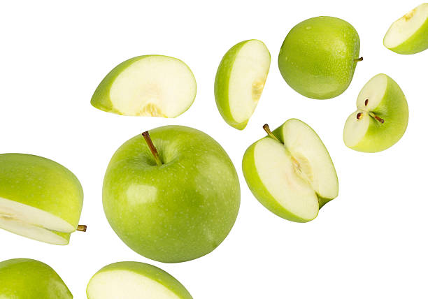 istock Falling Green Apple isolated on white background with clipping path, full depth of field 2251131265