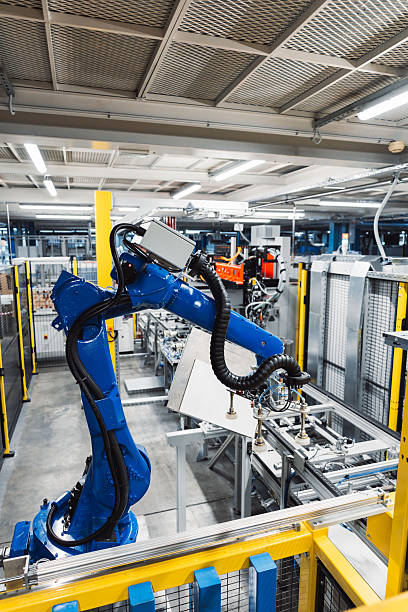 istock Industrial Robotic Arm in Factory Setting 2251133745