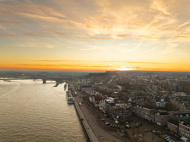 istock Nijmegen skyline at the river Waal during sunrise 2251134307