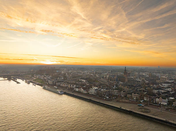 istock Nijmegen skyline at the river Waal during sunrise 2251134320